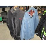 A Honda water proof jacket and a Wrangler jacket with a Harley Davidson patch on back XL