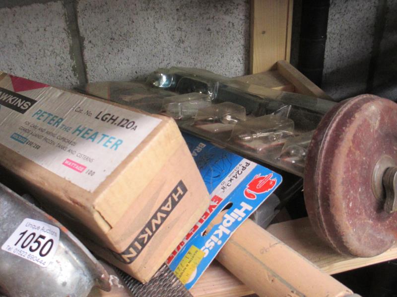 A good shelf of vintage items including Peter the Heater