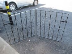 A pair of ornamental metal gates