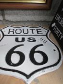 A cast iron Route 66 wall plaque