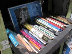 A box of various books including Bodywork Restoration,