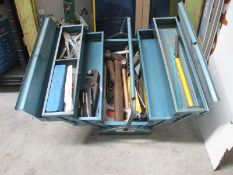 A cantilever metal toolbox with a comprehensive amount of tools