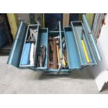 A cantilever metal toolbox with a comprehensive amount of tools