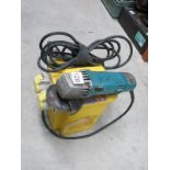 A 100 volt transformer and a 110 volt Makita angle grinder