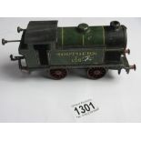 A Hornby O gauge tinplate clockwork train