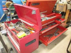 A large 7 drawer tool chest with tools and 5 drawer box full of tools