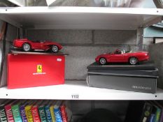 A boxed Burago Ferrari 250 Testarossa (1957) and a Maisto Jaguar XKR (1998(