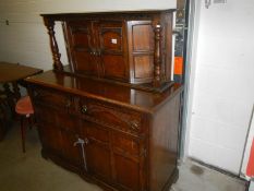 An oak Ercol style sideboard.