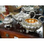 A Victorian 3 piece silver plate tea set with gilt interior.