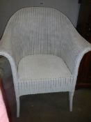 A Lloyd Loom bedroom chair in good condition.