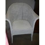 A Lloyd Loom bedroom chair in good condition.