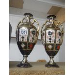 A pair of Crown Derby vases, 11" tall. In good order. No damage.