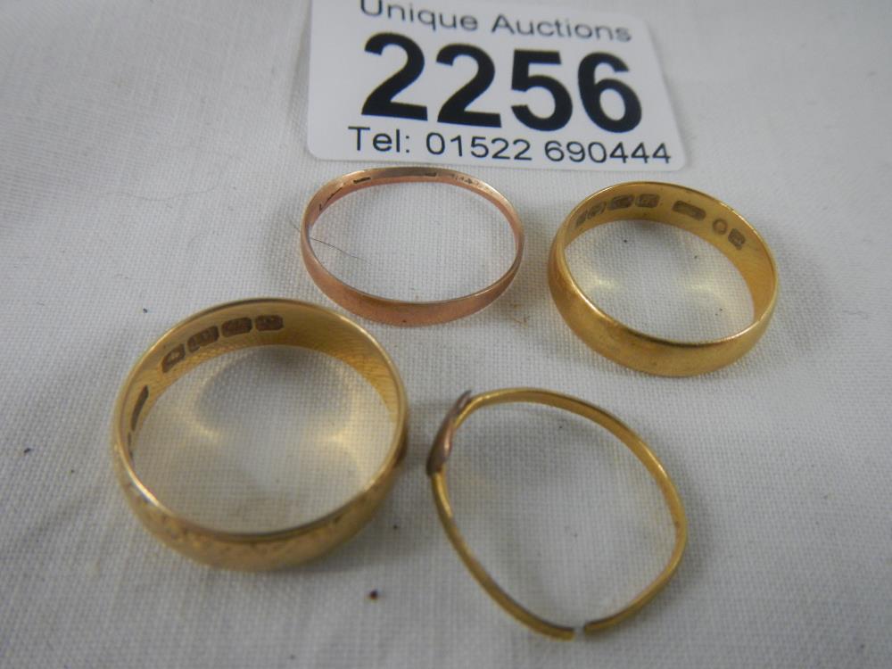 1 x 22ct gold ring (weight 4g) and 1 x 18ct gold ring (weight 4g) and 2 9ct gold rings