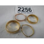 1 x 22ct gold ring (weight 4g) and 1 x 18ct gold ring (weight 4g) and 2 9ct gold rings