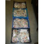 4 crated of GB, commonwealth and world stamps in unsorted packs.