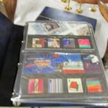 2 good albums of mint Royal Mail GB stamps, presentation packs and definitives, 80 in total.