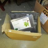 A box with an album of first day covers together with loose sleeves of covers and loose covers,