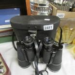 A cased pair of Weiss 16 x 30 binoculars.