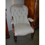 A Victorian mahogany framed gentleman's chair.