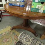 A Victorian mahogany tip top table.