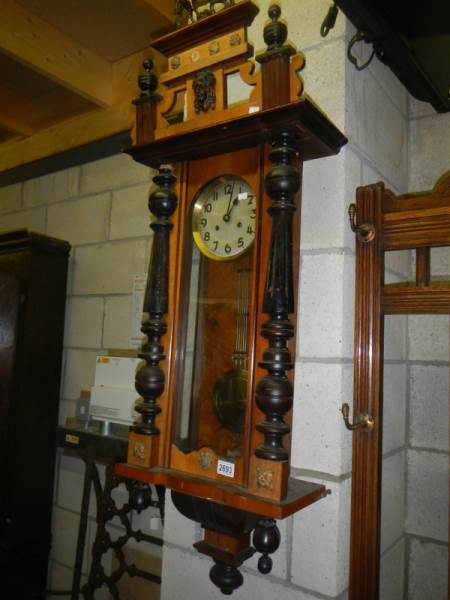 A Victorian Vienna wall clock.