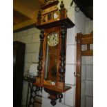 A Victorian Vienna wall clock.