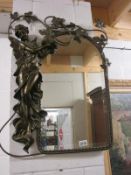 An Art Nouveau style wall mirror