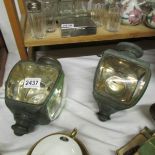 A pair of carriage lamps, probably late 19th century (one glass lens cracked).