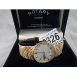 A good quality Rotary watch in yellow metal, in working order.