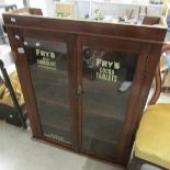 A Fry's milk chocolate advertising glazed cabinet.