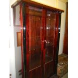 A top quality mahogany 2 door display cabinet.