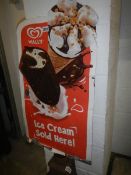 An old tin Wall's ice cream sign.