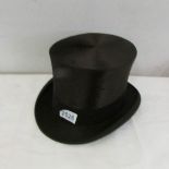 A vintage top hat marked 'Best Quality, London@.