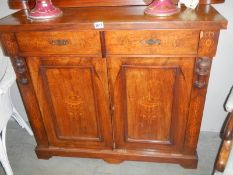 A Victorian inlaid credenza base.