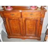 A Victorian inlaid credenza base.