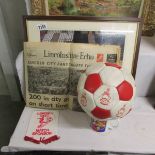 A signed Lincoln City FC football, 2 LCFC paperweights, a pennant,