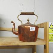 A copper kettle.