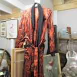 A vintage oriental silk robe.