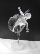 A boxed Swarovski crystal ballerina figure.