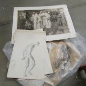 A quantity of early engravings and old master type pencil drawings including a cherub and a saint.