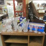 A mixed lot of cut glass vases etc.