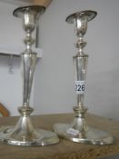 A pair of hall marked candlesticks,