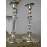 A pair of hall marked candlesticks,