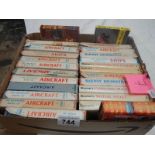 A box of Observer books.