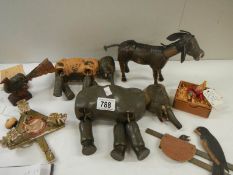 7 assorted wooden items. some in need of repair and larger elephant has leg missing.