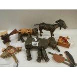 7 assorted wooden items. some in need of repair and larger elephant has leg missing.