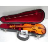A small cased violin with bow, 9" long.