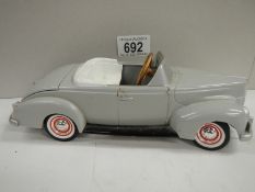 A model car by The Gearbox Pedal Car Company.