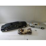 A model Mercedes 300SL (bonnet catch missing), A Mercedes SK and a Sunstar Lincoln Limousine.