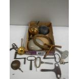 A mixed lot of clock parts including bells, keys etc.